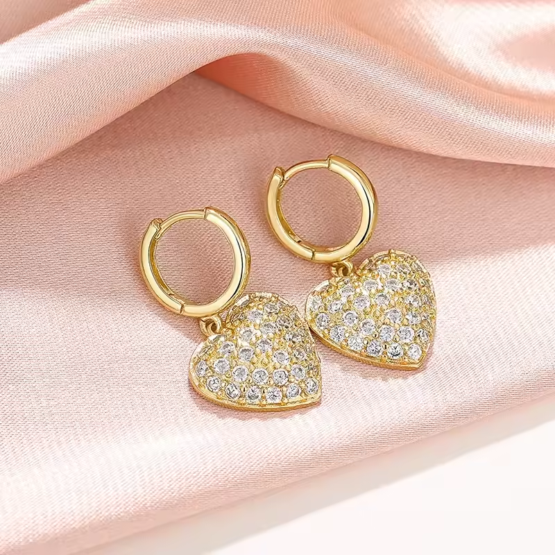 ✨ Élégance et éclat à votre portée avec nos boucles d'oreilles en acier inoxydable!